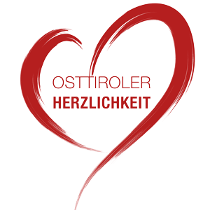 Das Logo für Osttiroler Herzlichkeit umrandet von einem roten Herz.
